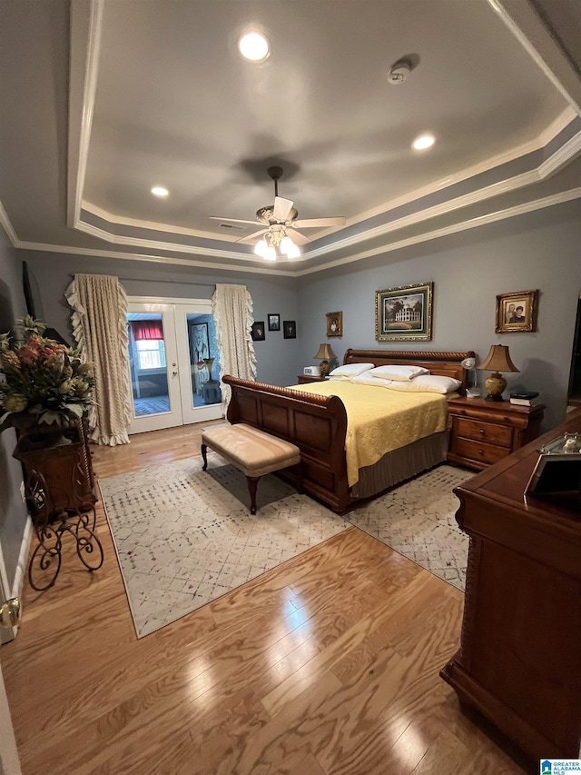 50 Ashton Ln, Sylacauga, AL 35150 - bedroom with a tray ceiling, access to exterior, wood finished floors, recessed lighting, and ornamental molding
