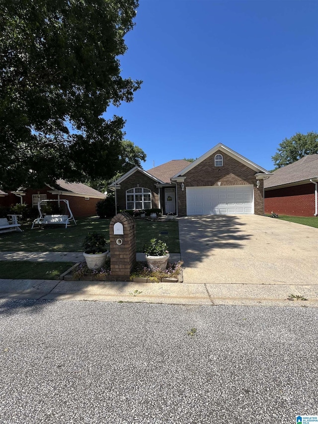 50 Ashton Ln, Sylacauga, AL 35150 - ranch-style home with driveway and a garage