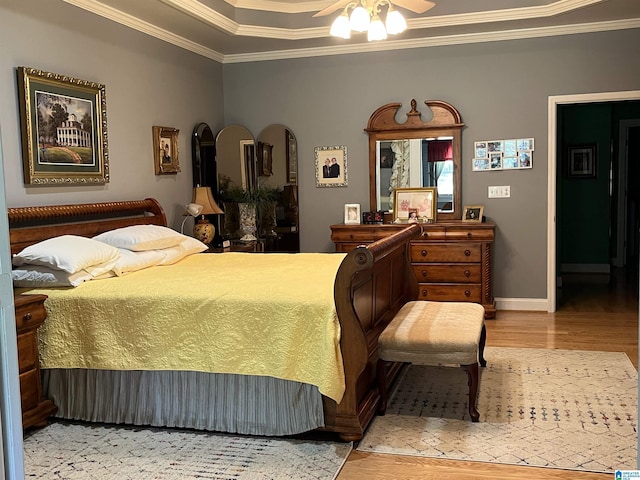 50 Ashton Ln, Sylacauga, AL 35150 - bedroom featuring ornamental molding, wood finished floors, baseboards, and a ceiling fan