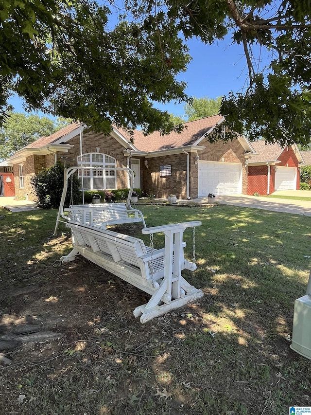 50 Ashton Ln, Sylacauga, AL 35150 - single story home with brick siding, a front yard, and an attached garage