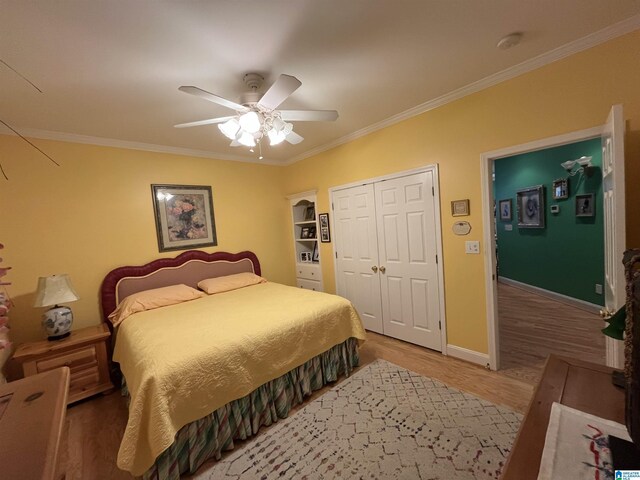 50 Ashton Ln, Sylacauga, AL 35150 - bedroom with ornamental molding, wood finished floors, a closet, baseboards, and a ceiling fan
