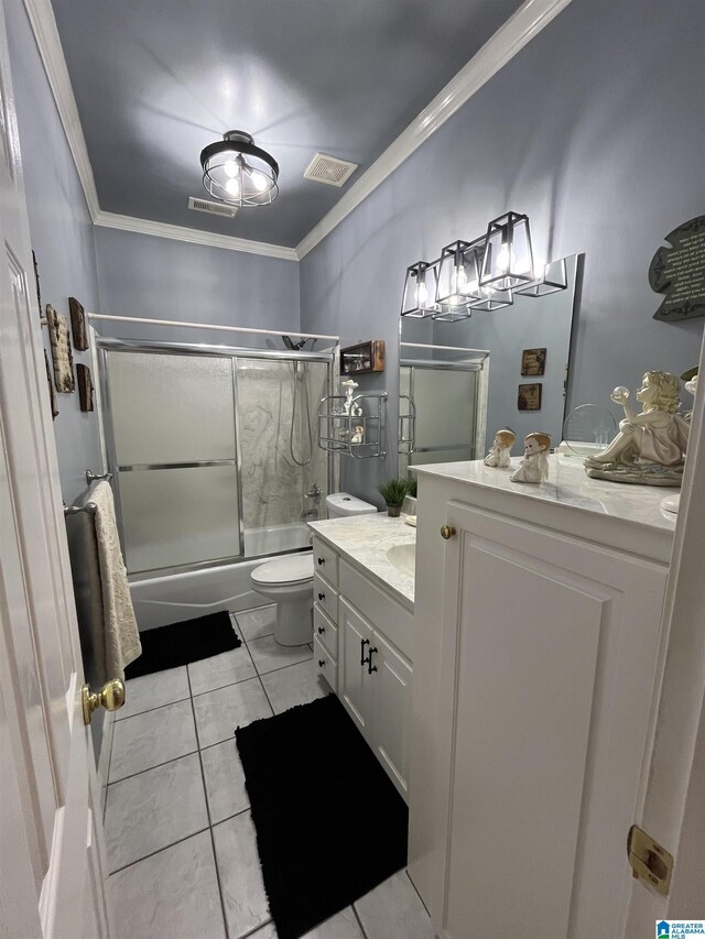 50 Ashton Ln, Sylacauga, AL 35150 - bathroom with crown molding, vanity, toilet, shower / bath combination with glass door, and tile patterned floors