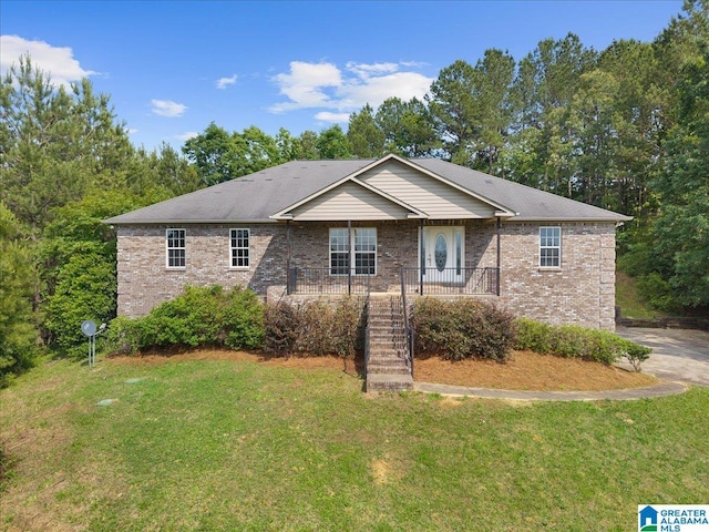 255 Savannah Ln, Cleveland, AL 35049 - view of front of home featuring a front yard, stairs, and brick siding