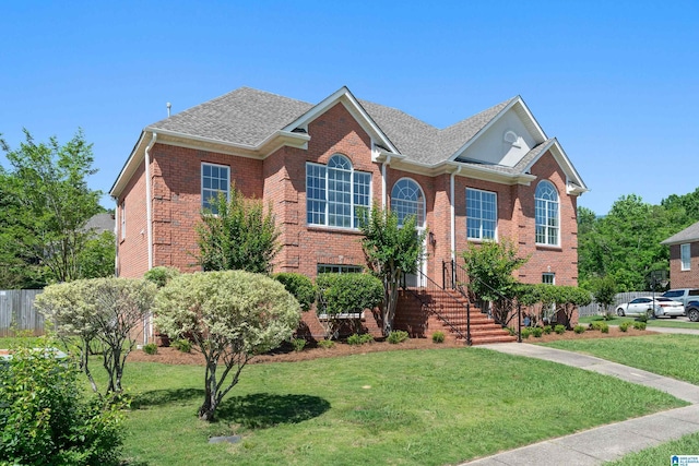 773 Old Cahaba Dr, Helena, AL 35080 - view of front facade featuring a front yard, brick siding, and roof with shingles