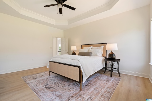 773 Old Cahaba Dr, Helena, AL 35080 - bedroom featuring a raised ceiling, light wood-style flooring, crown molding, and baseboards