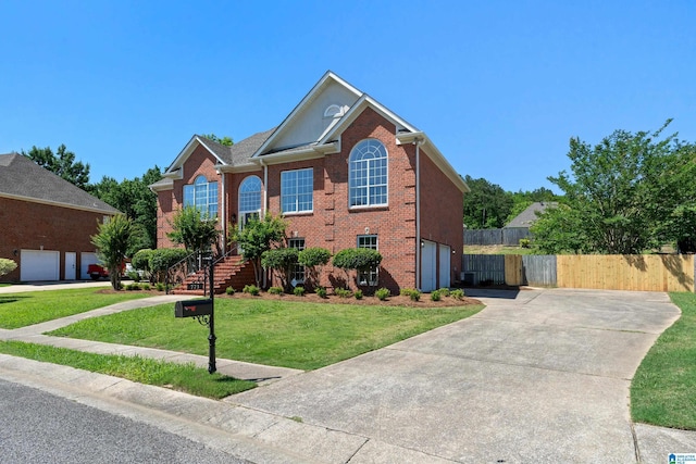 773 Old Cahaba Dr, Helena, AL 35080 - traditional-style house featuring concrete driveway, brick siding, a garage, and stairway