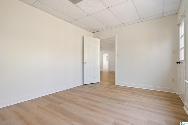 773 Old Cahaba Dr, Helena, AL 35080 - empty room featuring a paneled ceiling, light wood-type flooring, and baseboards