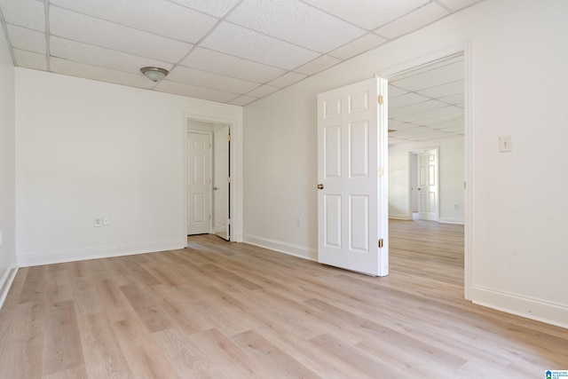 773 Old Cahaba Dr, Helena, AL 35080 - unfurnished room featuring a paneled ceiling, light wood-style flooring, and baseboards