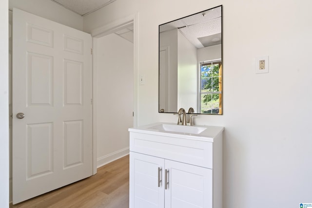 773 Old Cahaba Dr, Helena, AL 35080 - bathroom with vanity, wood finished floors, and baseboards