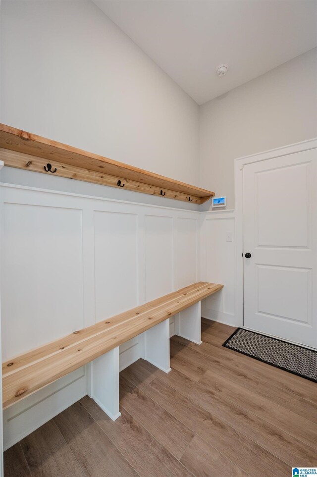 4651 Silas Ave, Hoover, AL 35244 - mudroom featuring light wood-type flooring, a decorative wall, and wainscoting
