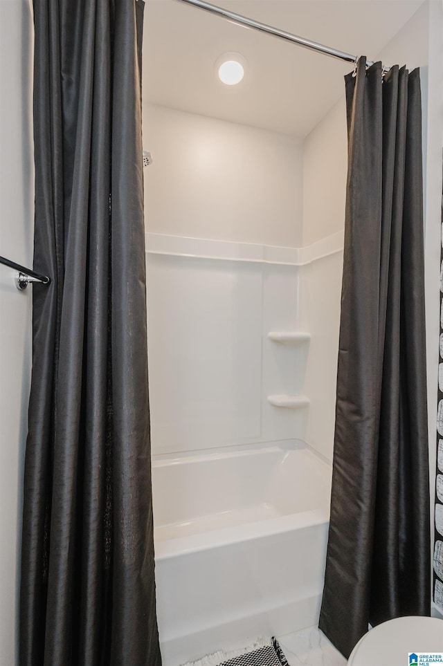 4651 Silas Ave, Hoover, AL 35244 - bathroom featuring toilet and shower / tub combo