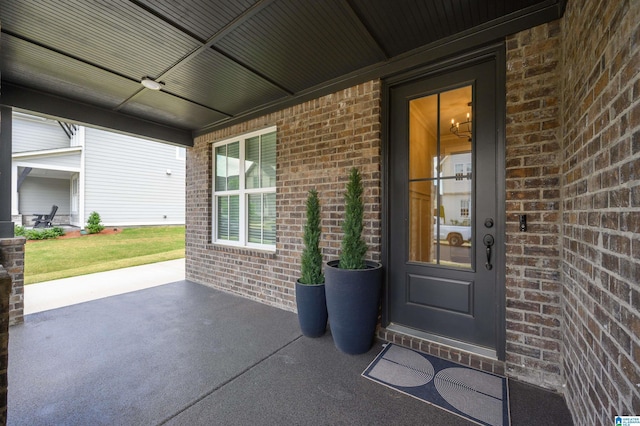 4651 Silas Ave, Hoover, AL 35244 - doorway to property with brick siding and covered porch