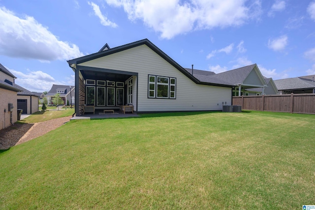 4651 Silas Ave, Hoover, AL 35244 - back of property with a sunroom and central AC unit