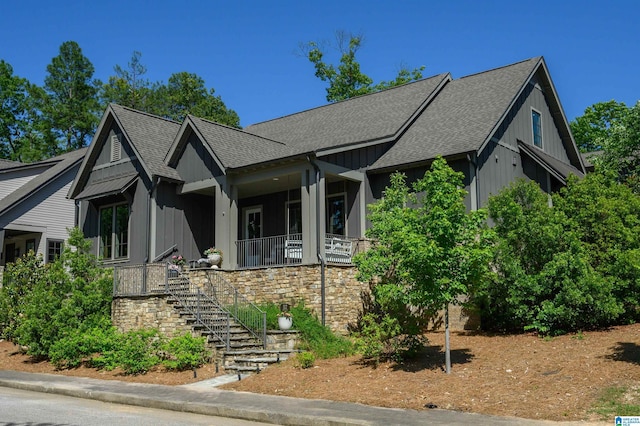 112 Perry Pl, Birmingham, AL 35242 - view of front of home featuring roof with shingles, covered porch, stairway, and board and batten siding