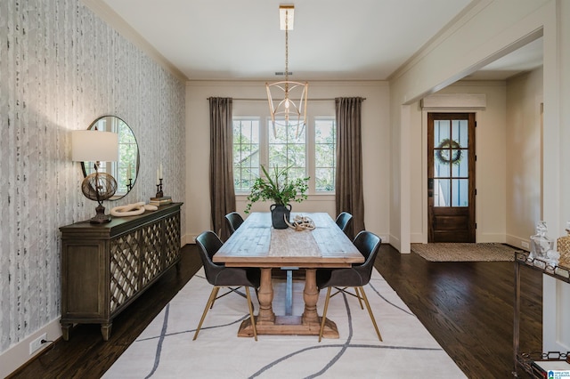 112 Perry Pl, Birmingham, AL 35242 - dining space featuring dark wood-type flooring, wallpapered walls, a chandelier, and baseboards