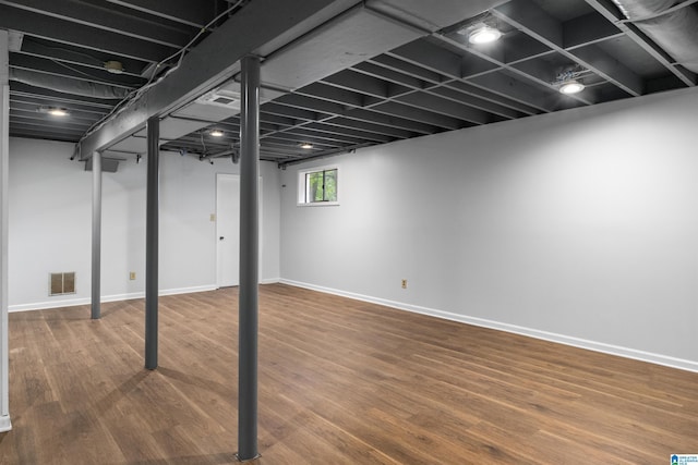 1718 Teakwood Ln, Birmingham, AL 35235 - below grade area with wood finished floors and baseboards