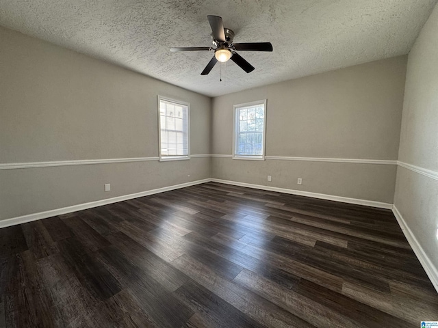 804 Elm Ave, Gadsden, AL 35903 - unfurnished room with dark wood-type flooring, a ceiling fan, a textured ceiling, and baseboards