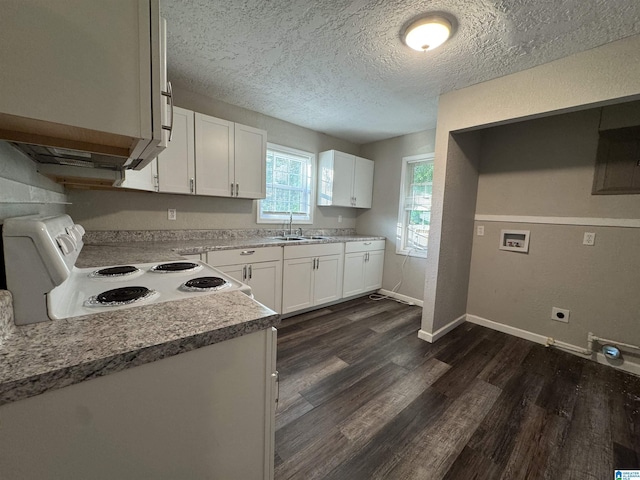 804 Elm Ave, Gadsden, AL 35903 - kitchen featuring white electric stove, a sink, dark wood-style floors, white cabinetry, and a textured ceiling