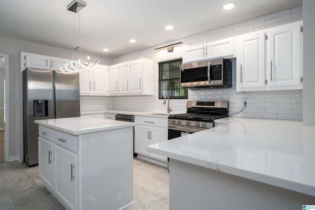 4100 S Shades Crest Rd, Hoover, AL 35244 - kitchen featuring stainless steel appliances, a sink, tasteful backsplash, white cabinetry, and recessed lighting