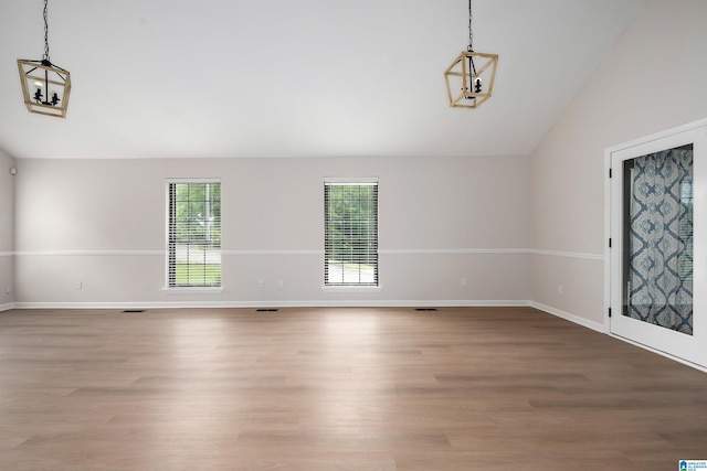 4100 S Shades Crest Rd, Hoover, AL 35244 - spare room featuring lofted ceiling, light wood-style floors, and baseboards