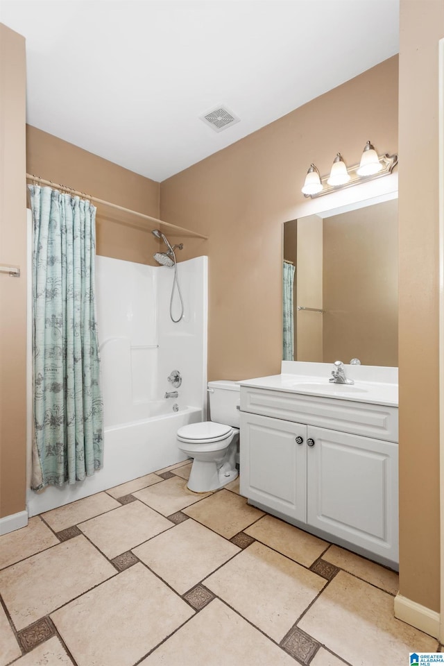 2212 Adkins Cir, Moody, AL 35004 - bathroom with vanity, toilet, and shower / tub combo with curtain