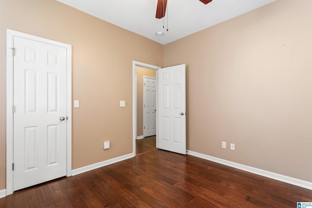 2212 Adkins Cir, Moody, AL 35004 - unfurnished bedroom with dark wood finished floors, baseboards, and a ceiling fan