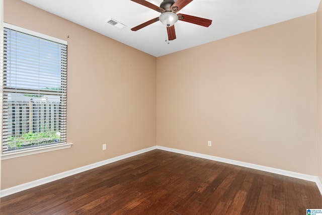 2212 Adkins Cir, Moody, AL 35004 - empty room featuring dark wood-type flooring, baseboards, and ceiling fan