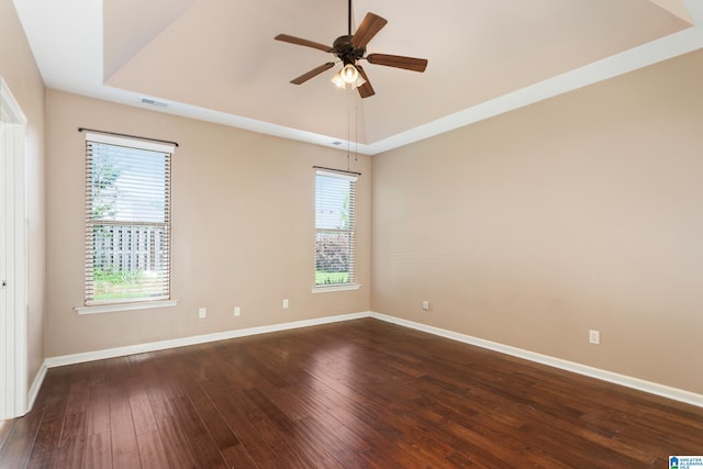 2212 Adkins Cir, Moody, AL 35004 - spare room featuring dark wood-type flooring, ceiling fan, and baseboards