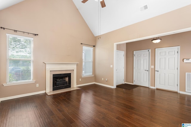 2212 Adkins Cir, Moody, AL 35004 - unfurnished living room featuring a ceiling fan, wood-type flooring, high vaulted ceiling, baseboards, and a fireplace with flush hearth