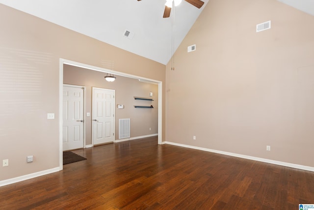 2212 Adkins Cir, Moody, AL 35004 - empty room with ceiling fan, high vaulted ceiling, dark wood-type flooring, and baseboards