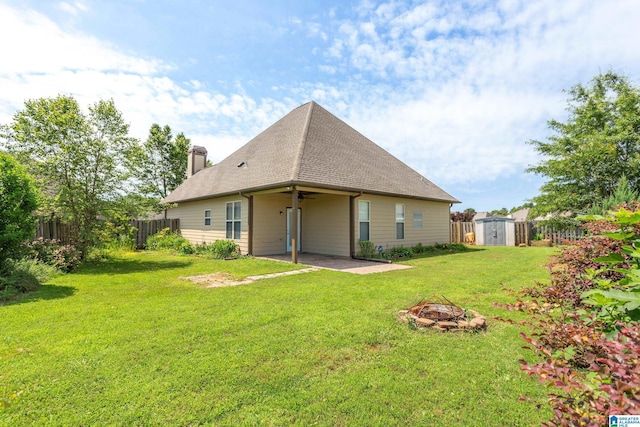 2212 Adkins Cir, Moody, AL 35004 - back of house featuring a ceiling fan, an outdoor fire pit, a patio, a chimney, and roof with shingles