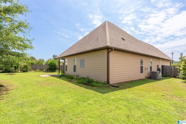 2212 Adkins Cir, Moody, AL 35004 - view of side of property with central air condition unit and roof with shingles