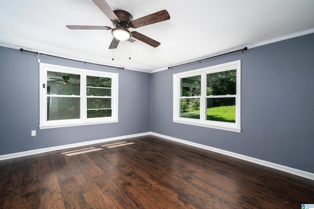 140 Camelia Ave, Gardendale, AL 35071 - spare room with baseboards, dark wood-style flooring, and a ceiling fan