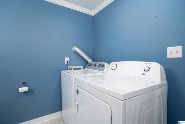 140 Camelia Ave, Gardendale, AL 35071 - laundry area featuring washing machine and clothes dryer, ornamental molding, and baseboards