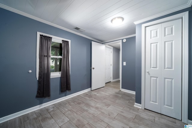 140 Camelia Ave, Gardendale, AL 35071 - empty room with crown molding, baseboards, and light wood-style flooring