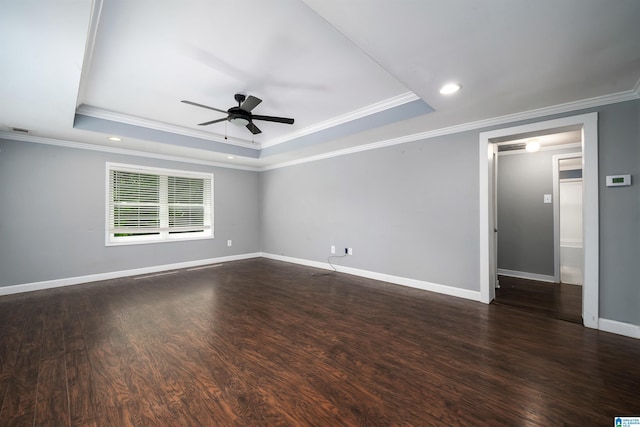 140 Camelia Ave, Gardendale, AL 35071 - spare room featuring a raised ceiling, ceiling fan, crown molding, dark wood-type flooring, and baseboards