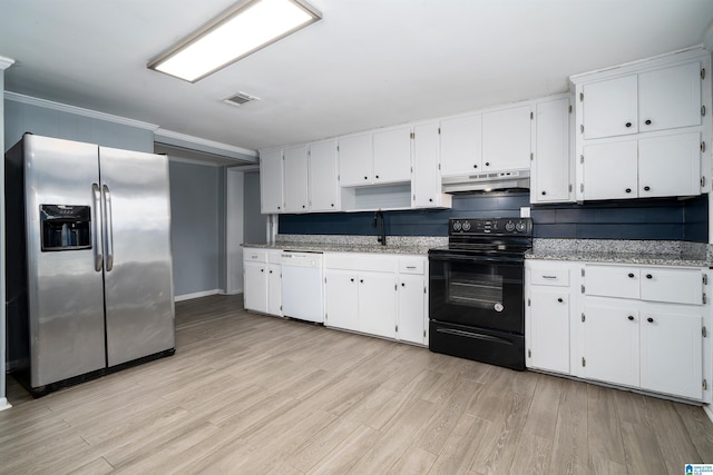 140 Camelia Ave, Gardendale, AL 35071 - kitchen with stainless steel fridge, black electric range oven, white dishwasher, under cabinet range hood, and light wood-style floors