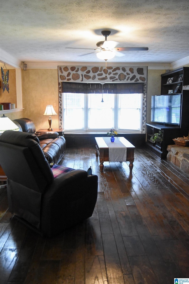 3908 Cloverdale Rd, Anniston, AL 36207 - living area with hardwood / wood-style flooring, plenty of natural light, a ceiling fan, and a textured ceiling
