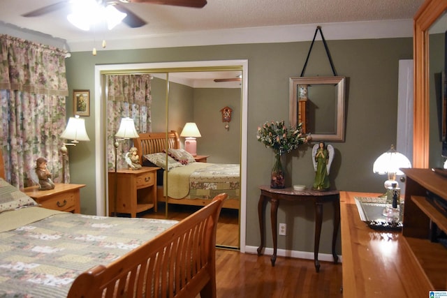 3908 Cloverdale Rd, Anniston, AL 36207 - bedroom featuring a closet, wood finished floors, and a ceiling fan