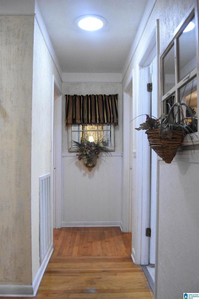 3908 Cloverdale Rd, Anniston, AL 36207 - corridor featuring wood finished floors and ornamental molding