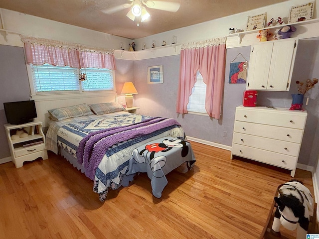 3908 Cloverdale Rd, Anniston, AL 36207 - bedroom featuring light wood finished floors, baseboards, and a ceiling fan
