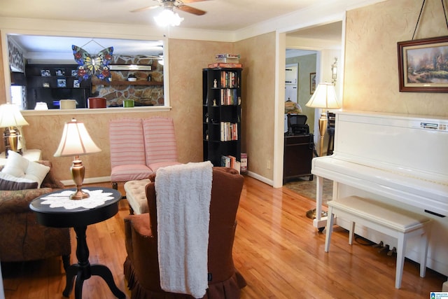 3908 Cloverdale Rd, Anniston, AL 36207 - sitting room with wood finished floors, ceiling fan, and ornamental molding