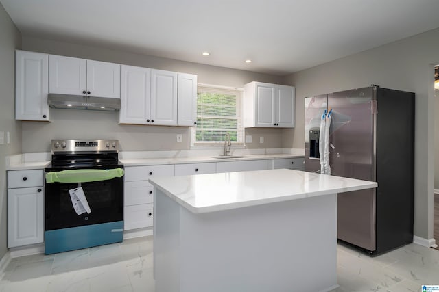 1644 1st St NE, Center Point, AL 35215 - kitchen featuring appliances with stainless steel finishes, under cabinet range hood, light marble finish flooring, recessed lighting, and a sink