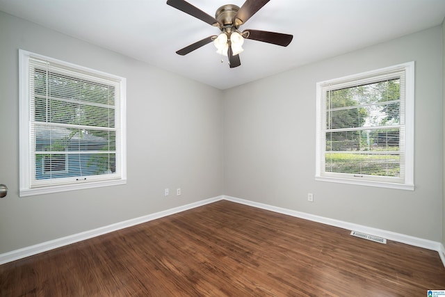 1644 1st St NE, Center Point, AL 35215 - unfurnished room featuring baseboards, dark wood-style floors, and ceiling fan
