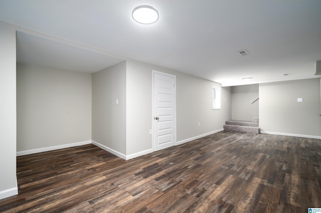 1644 1st St NE, Center Point, AL 35215 - below grade area with dark wood-type flooring, baseboards, and stairs