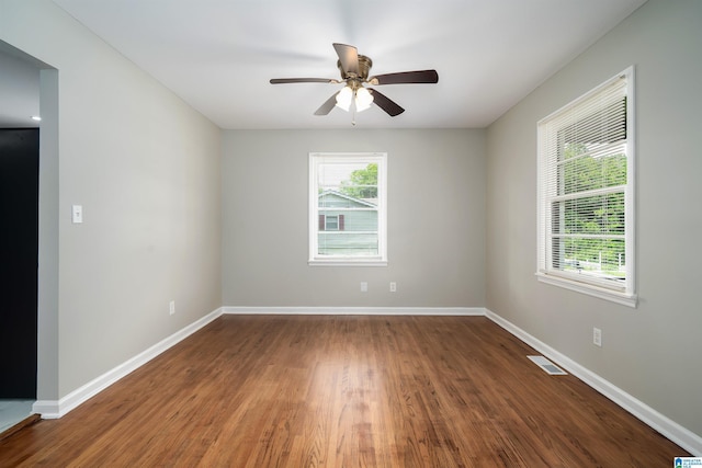 1644 1st St NE, Center Point, AL 35215 - empty room featuring ceiling fan, wood finished floors, and baseboards