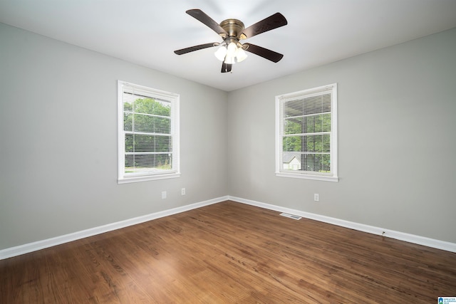 1644 1st St NE, Center Point, AL 35215 - empty room featuring baseboards, wood finished floors, and a ceiling fan
