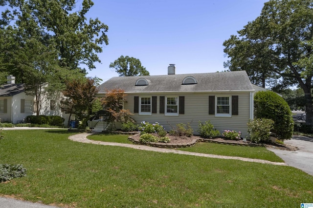 39 Edgehill Rd, Homewood, AL 35209 - view of front facade with a front yard and a chimney