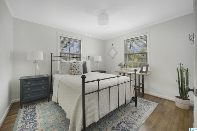 39 Edgehill Rd, Homewood, AL 35209 - bedroom featuring multiple windows, wood finished floors, baseboards, and crown molding