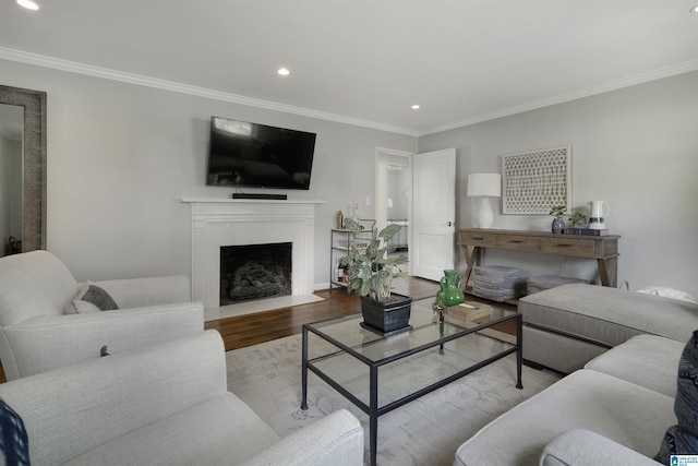 39 Edgehill Rd, Homewood, AL 35209 - living room with ornamental molding, wood finished floors, a fireplace with flush hearth, and recessed lighting